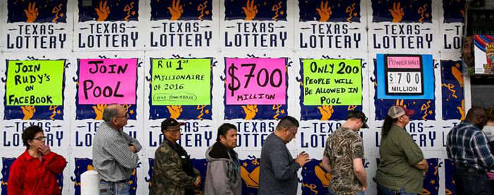 People stand in line to buy lottery tickets